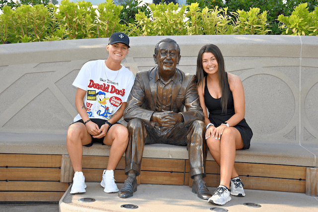 Emily Chiasson & Family at Disney Statue